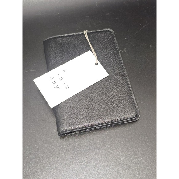 a new day Handbags - A New Day Black Pebbled Passport Wallet New With Tags